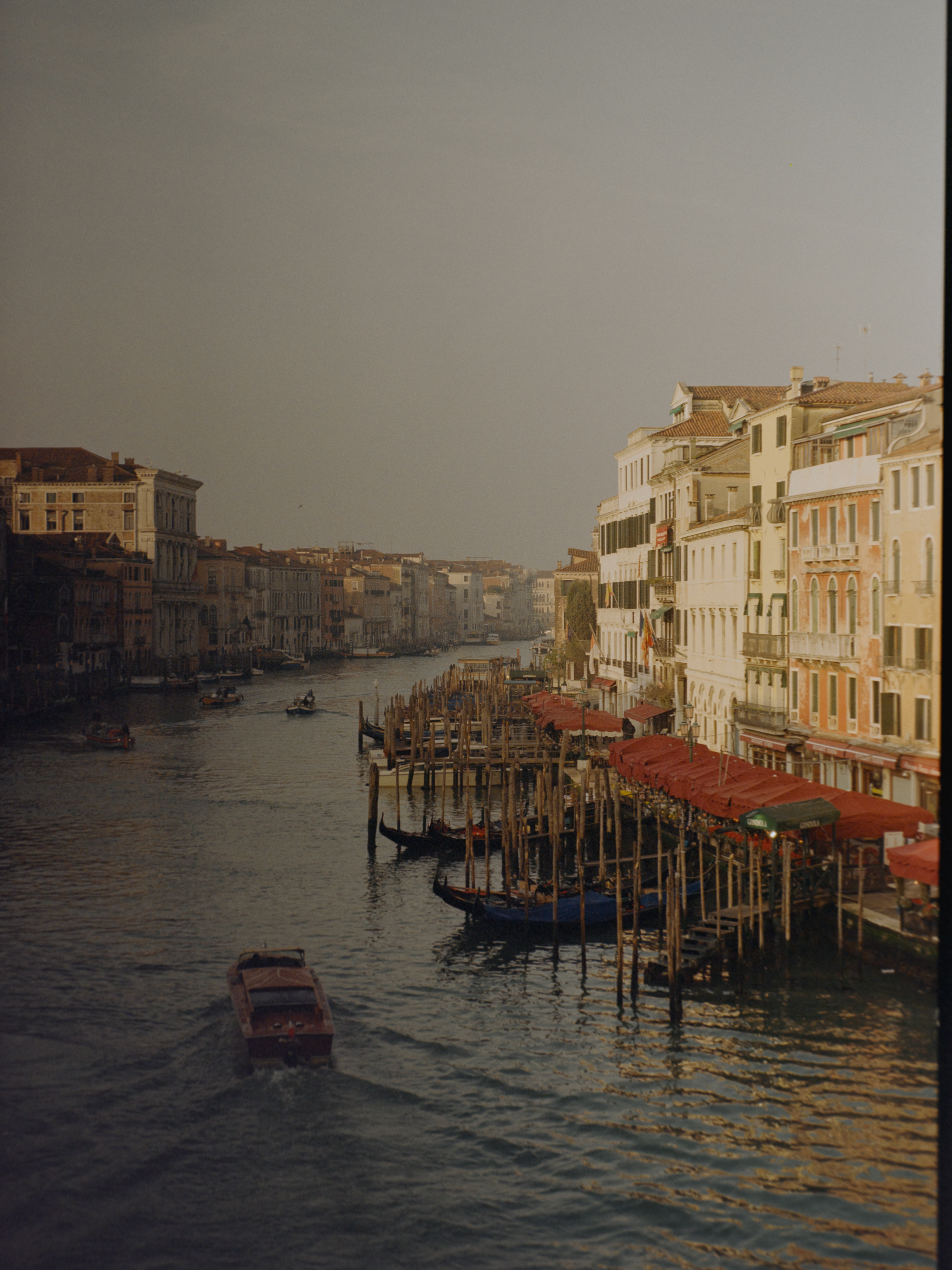 Sweeping view of the Grand Canal at golden hour with gondolas and palazzi — Venice on Kodak Gold 200