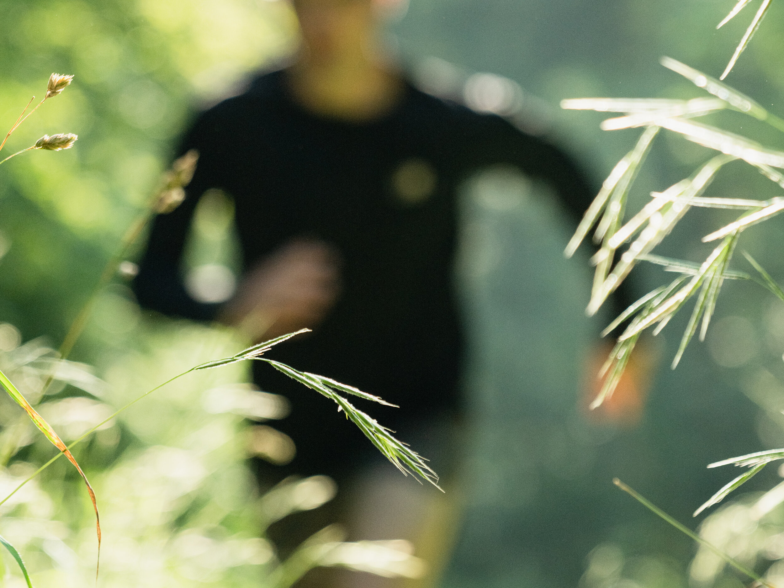 motion blur runner through meadow lifestyle photographer london