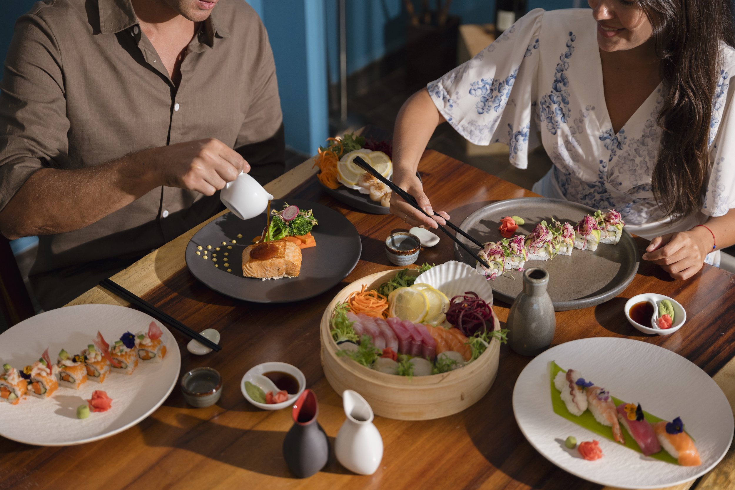 Couple dining sushi sashimi sake Japanese restaurant