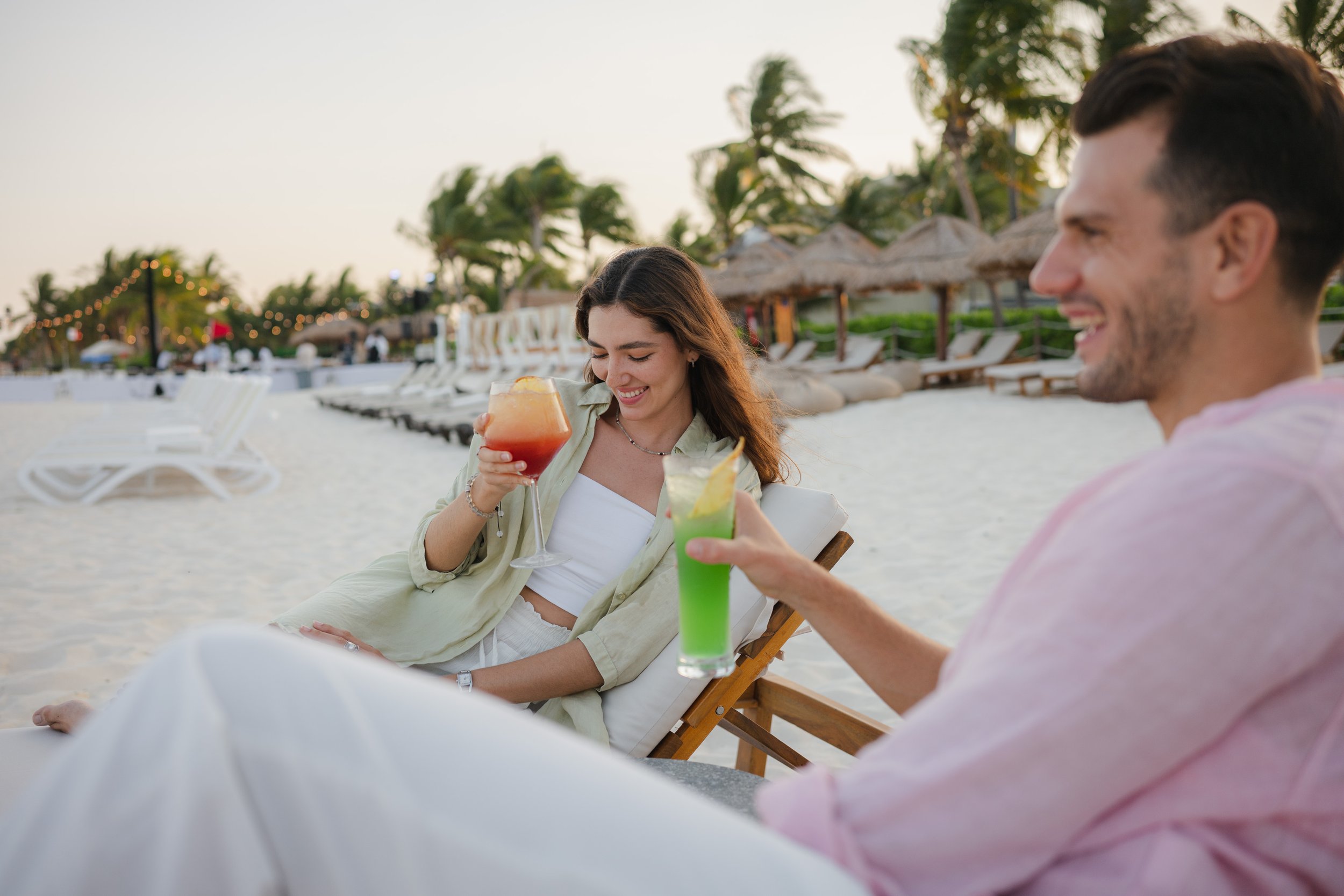 Couple beach cocktails sunset Riviera Maya luxury resort, lifestyle photographer London